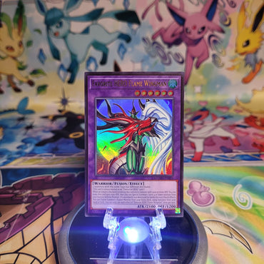 An Ultra Rare "Favorite Hero Flame Wingman" card from the Yugioh Set: Magnificent Monsters (MAMO).