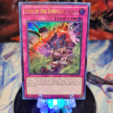  An Ultra Rare "Fists of the Unrivaled Tenyi" card from the Yugioh Set: Ghosts From the Past: The 2nd Haunting (GFP2).