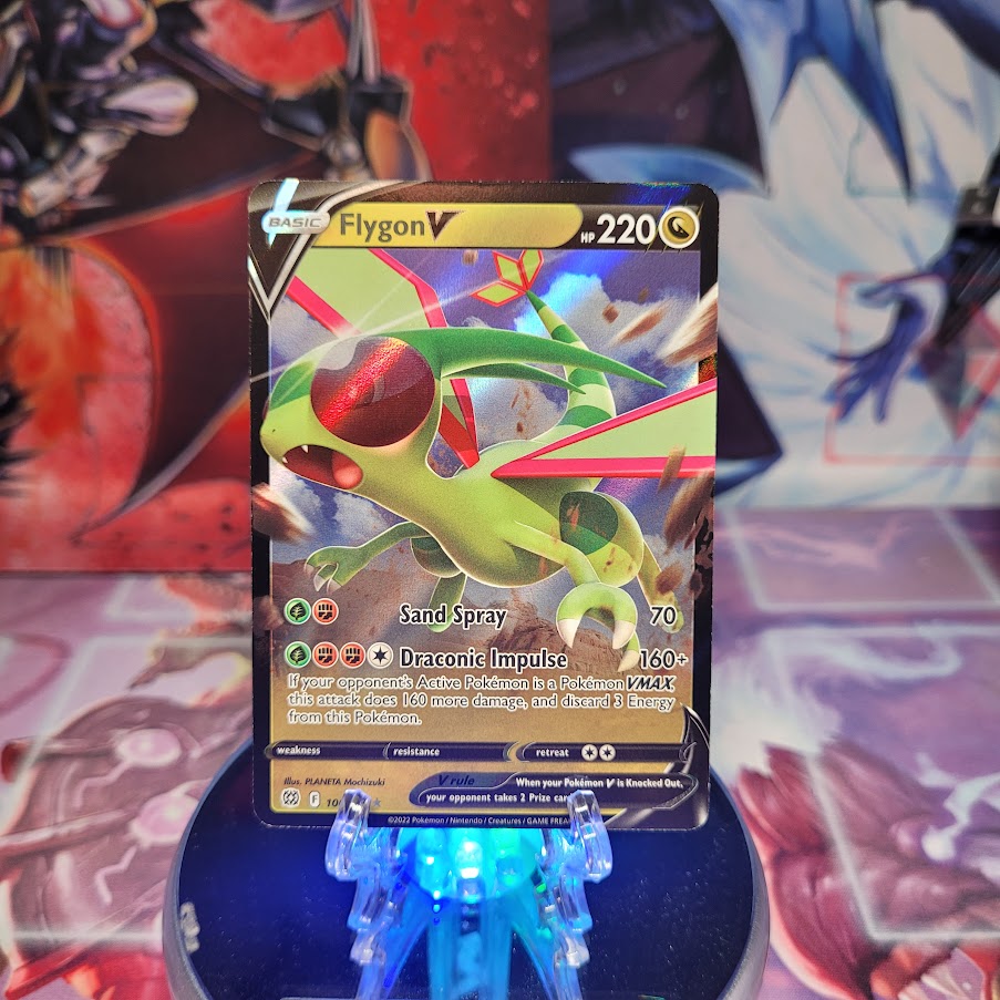 An Ultra Rare "Flygon V" (106/172) card from the Pokemon Set: Brilliant Stars.