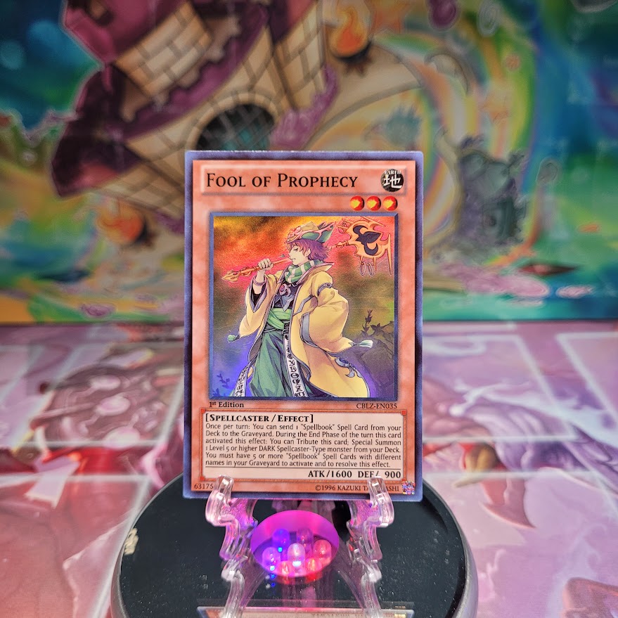 A Super Rare "Fool of Prophecy" card from the Yugioh Set: Cosmo Blazer.