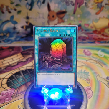 An Ultra Rare "Foolish Burial" card from the Yugioh Structure Deck: The Fallen & The Virtuous (CH01).