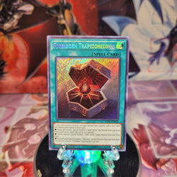 A Secret Rare "Forbidden Trapezohedron" card from the Yugioh Set: Shadows in Valhalla.