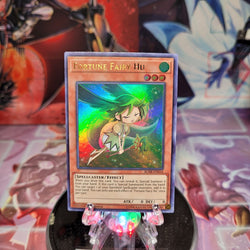 An Ultra Rare "Fortune Fairy Hu" card from the Yugioh Set: Battles of Legend: Hero's Revenge (BLHR).