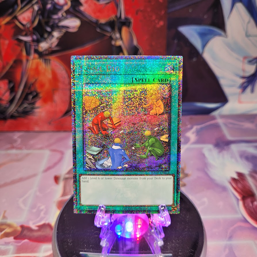 A Quarter Century Secret Rare "Fossil Dig" card from the Yugioh Set: Rarity Collection 1 (RA01).
