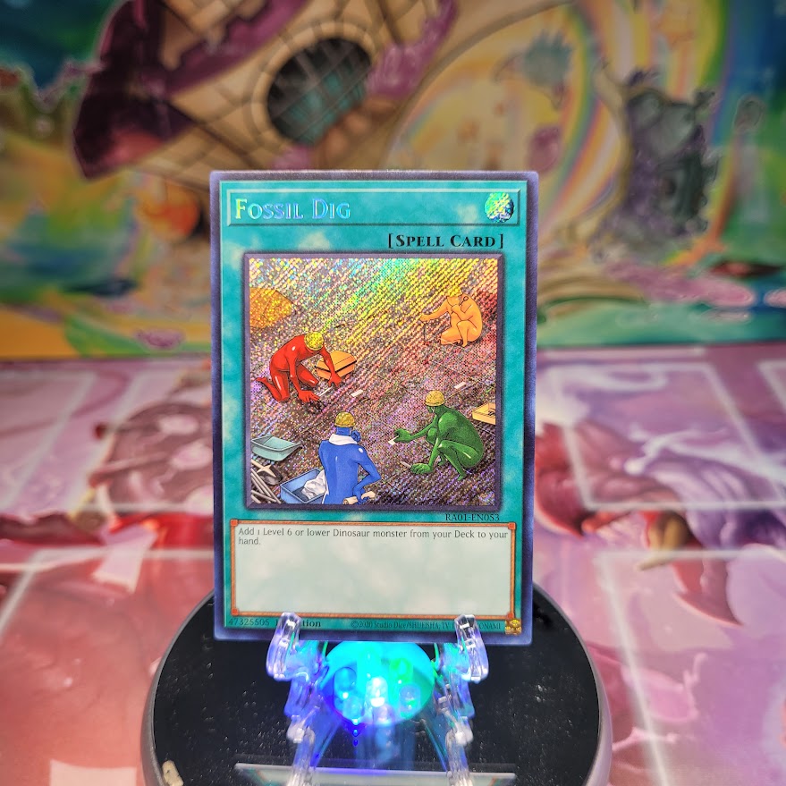 A Secret Rare "Fossil Dig" card from the Yugioh Set: Rarity Collection 1 (RA01).