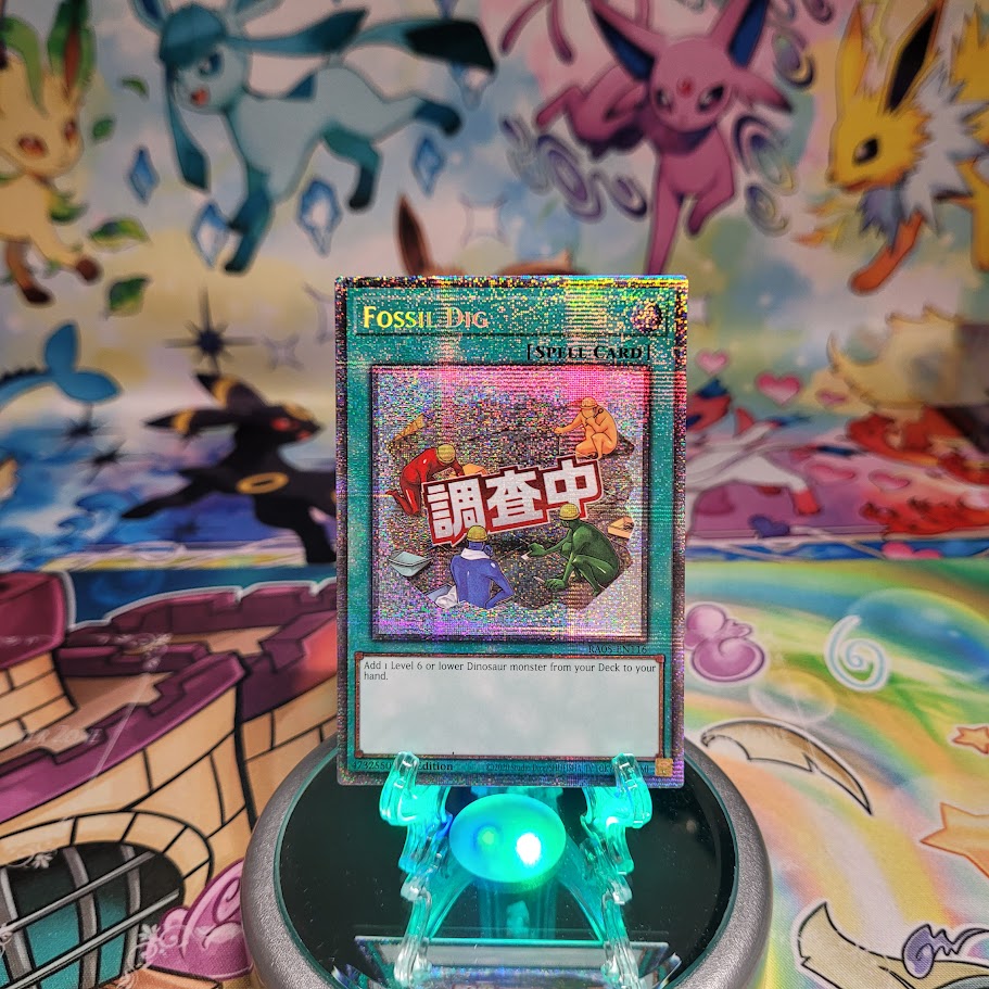 A Starlight Rare "Fossil Dig" card from the Yugioh Set: Rarity Collection 5 (RA05).