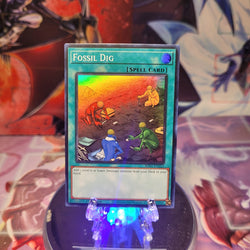 A Super Rare "Fossil Dig" card from the Yugioh Set: Rarity Collection 1 (RA01).