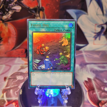 An Ultra Rare "Fossil Dig" card from the Yugioh Set: Rarity Collection 1 (RA01).