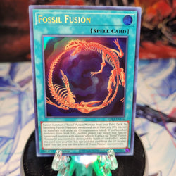  An Ultra Rare "Fossil Fusion" card from the Yugioh Set: Ghosts From the Past: The 2nd Haunting (GFP2).