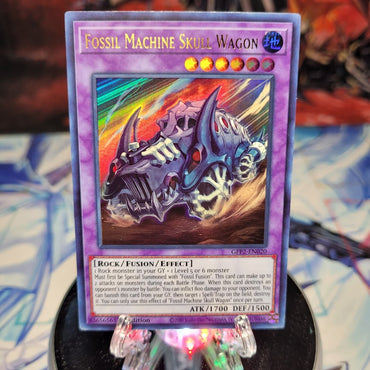 An Ultra Rare "Fossil Machine Skull Wagon" card from the Yugioh Set: Ghosts From the Past: The 2nd Haunting (GFP2).