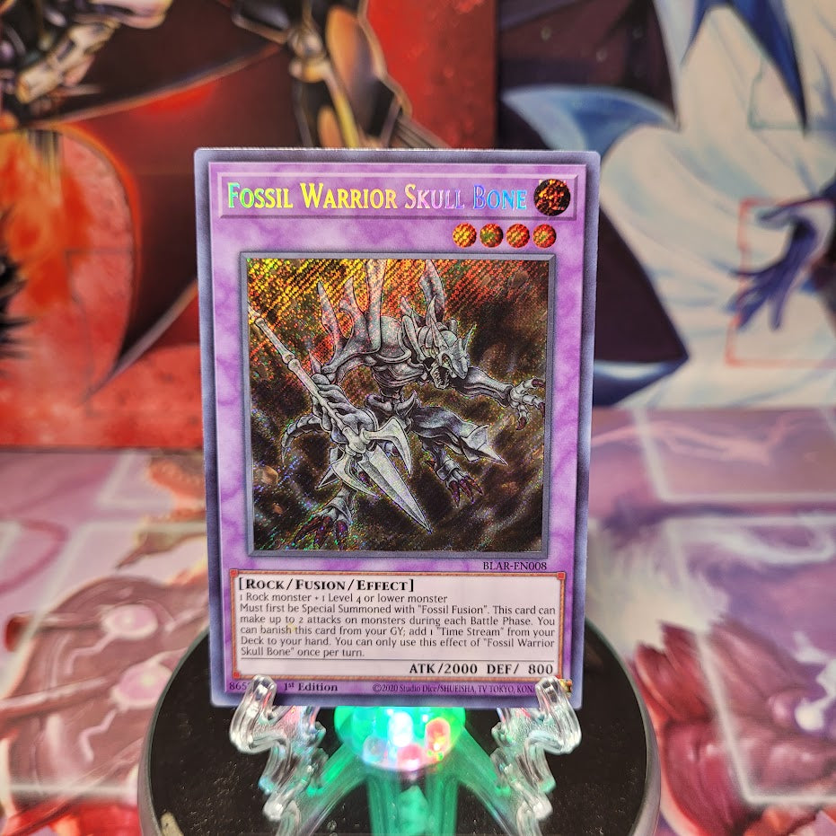 A Secret Rare "Fossil Warrior Skull King" card from the Yugioh Set: Battles of Legend: Armageddon (BLAR).