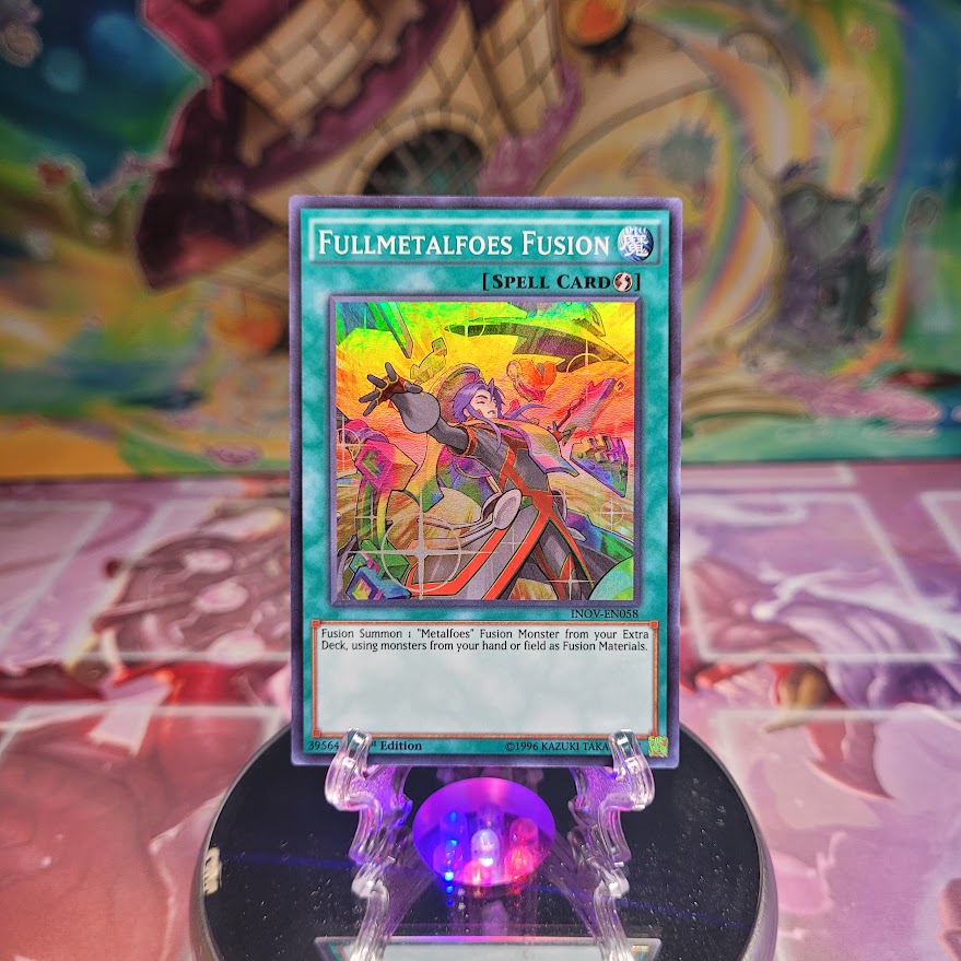 A Super Rare "Fullmetalfoes Fusion" card from the Yugioh Set: Invasion: Vengeance (INOV).