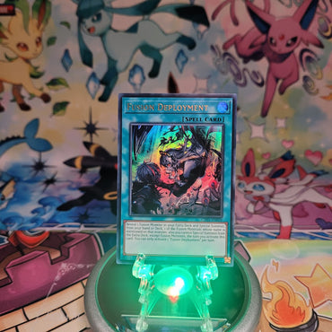 An Ultra Rare "Fusion Deployment" card from the Yugioh Structure Deck: The Fallen & The Virtuous (CH01).