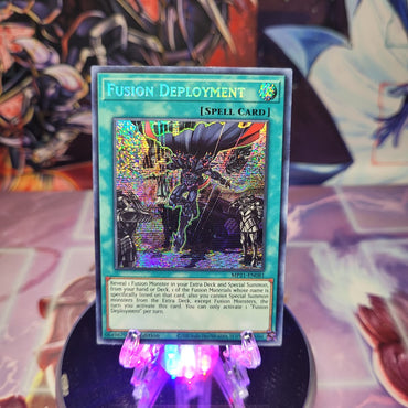 A Prismatic Secret Rare "Fusion Deployment" card from the Yugioh 2021 Tin of Ancient Battles.