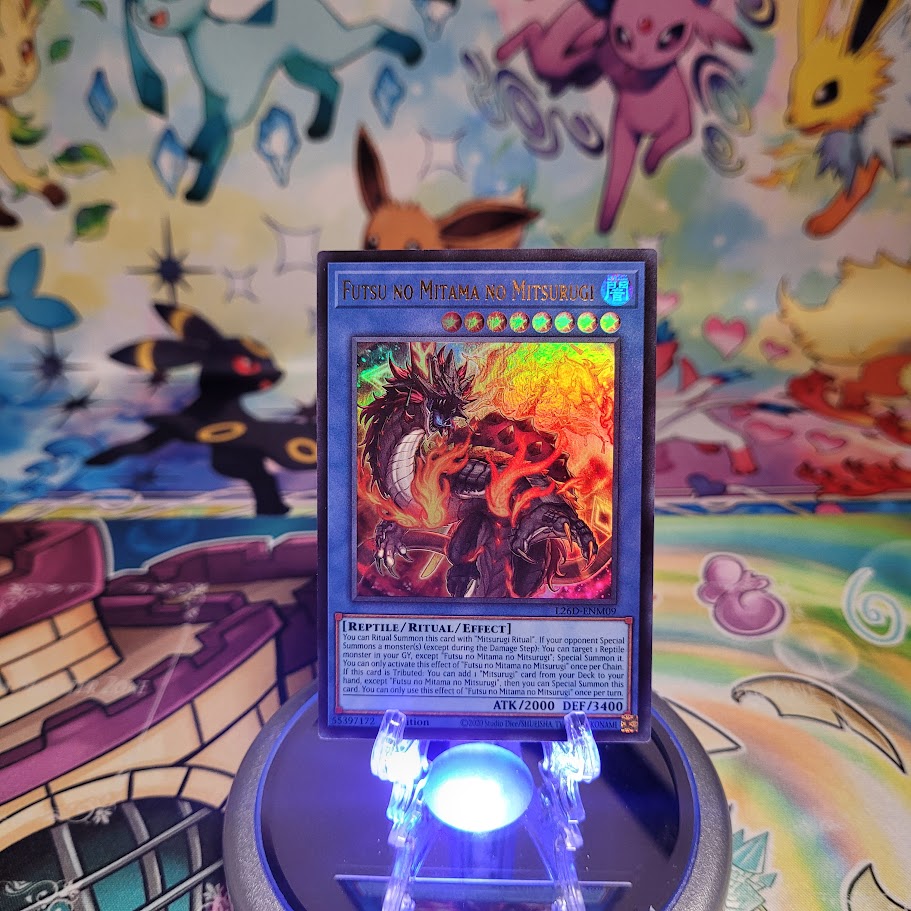 An Ultra Rare "Futsu No Mitama No Mitsurugi" card from the Yugioh Legendary Modern Decks (L26D).