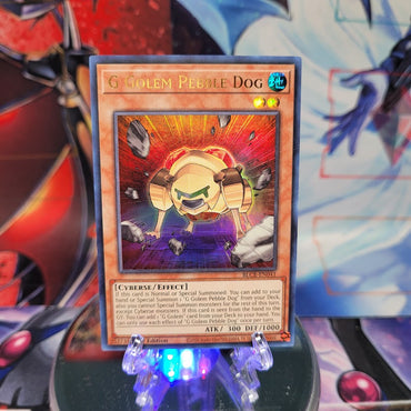 An Ultra Rare "G Golem Pebble Dog" card from the Yugioh Set: Battles of Legend: Crystal Revenge.