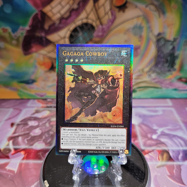 A Prismatic Ultimate Rare "Gagaga Cowboy" card from the Yugioh Set: Quarter Century Stampede (RA04).