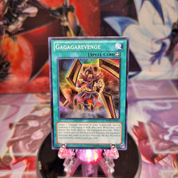A Super Rare "Gagagarevenge" card from the Yugioh Set: Return of the Duelist (REDU).