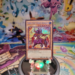 A Secret Rare "Gaia the Fierce Knight" card from the Yugioh Set: Maze of Muertos (MZMU).