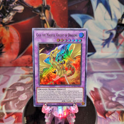 A Super Rare "Gaia the Magical Knight of Dragons" card from the Yugioh Set: Rise of the Duelist (ROTD).