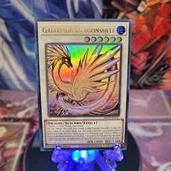 An Ultra Rare "Gaiarmor Dragonshell" card from the Yugioh 2022 Tin of the Pharaoh's Gods Set.