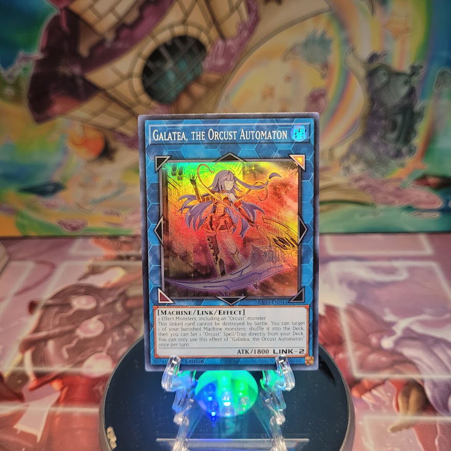 A Super Rare "Galatea, the Orcust Automaton" card from the Yugioh Set: Quarter Century Bonanza (RA03).