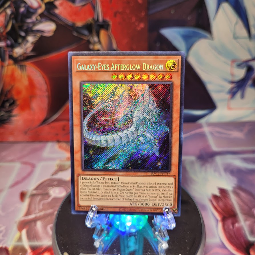 A Secret Rare "Galaxy-Eyes Afterglow Dragon" card from the Yugioh Set: Rarity Collection 1 (RA01).