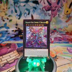 A Secret Rare "Galaxy-Eyes Cipher X Dragon" card from the Yugioh Set: Battles of Legend: Glorious Gallery (BLGG).