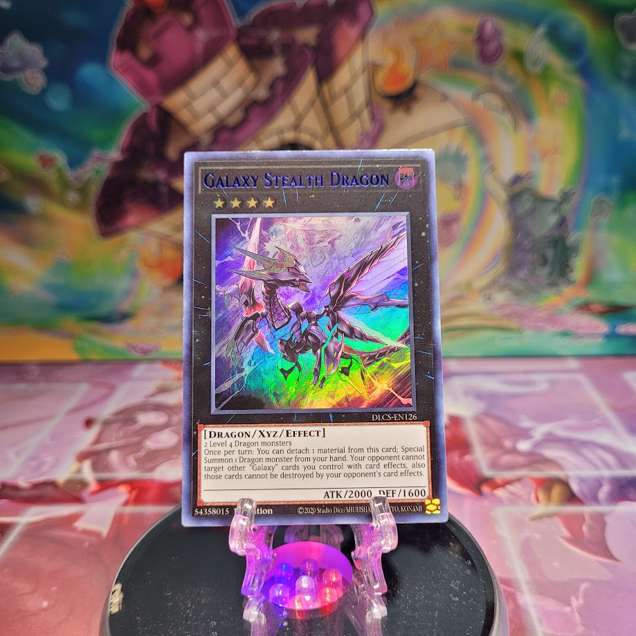 An Ultra Rare Blue Letter "Galaxy Stealth Dragon" card from the Yugioh Set: Dragons of Legend: The Complete Series.