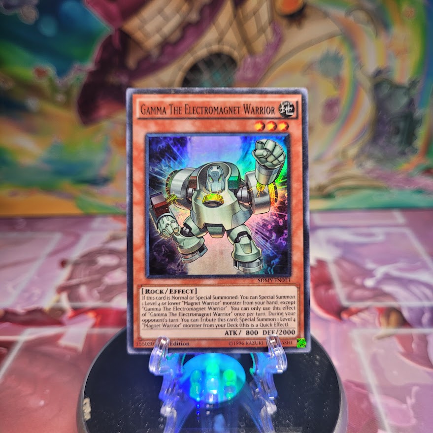 A 1st edition Super Rare "Gamma the Electromagnet Warrior" card from the Yugioh Structure Deck: Yugi Moto.