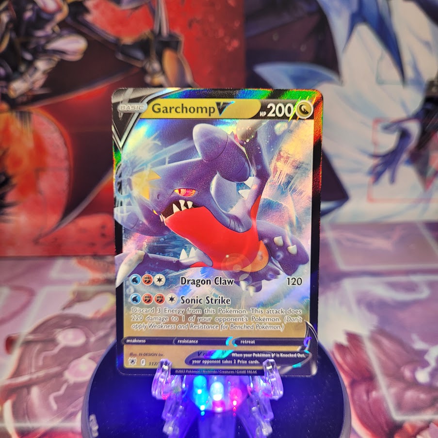 An Ultra Rare "Garchomp V" (117/189) card from the Pokemon Set: Astral Radiance.