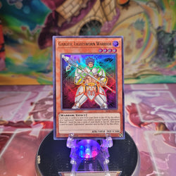 A 1st edition Ultimate Rare "Garoth, Lightsworn Warrior" card from the Yugioh Set: Battles of Legend: Lights Revenge.