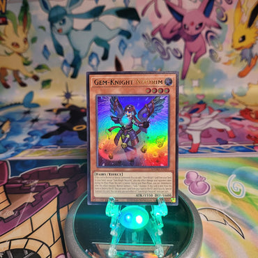 An Ultra Rare "Gem-Knight Nepyrim" card from the Yugioh Set: Magnificent Monsters (MAMO).