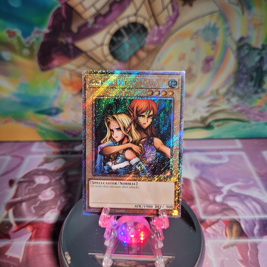 A Platinum Secret Rare "Gemini Elf" card from the Yugioh Set: Quarter Century Bonanza (RA03)