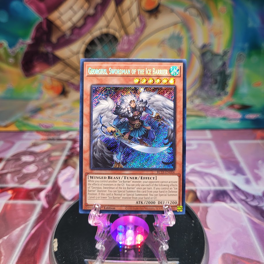 A Secret Rare "Georgius, Swordman of the Ice Barrier" card from the Yugioh Set: Battles of Legend: Terminal Revenge (BLTR).
