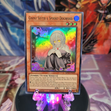 A Super Rare "Ghost Sister & Spooky Dogwood" card from the Yugioh 2022 Tin of the Pharaoh's Gods Set.