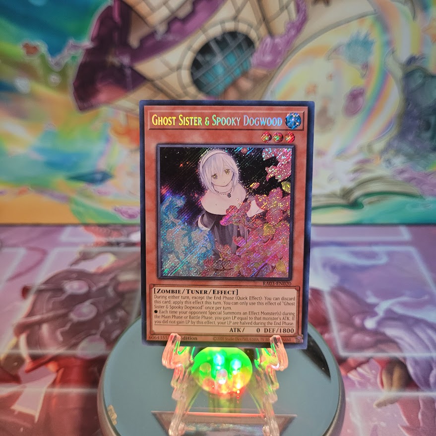 A Secret Rare "Ghost Sister & Spooky Dogwood" card from the Yugioh Set: Quarter Century Bonanza (RA03).