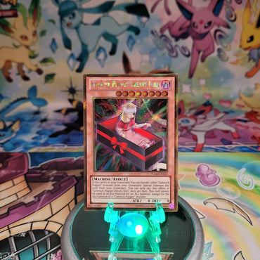 A Gold Secret Rare "Gimmick Puppet Dreary Doll" card from the Yugioh Set: Premium Gold (PGLD).