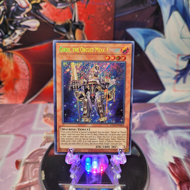 A Secret Rare "Girsu, the Orcust Mekk Knight" card from the Yugioh Set: Eternity Code.