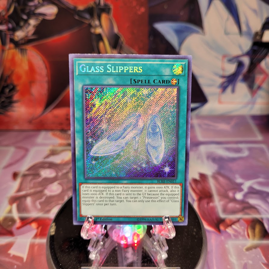 A Secret Rare "Glass Slippers" card from the Yugioh Set: Battles of Legend: Relentless Revenge (BLRR).