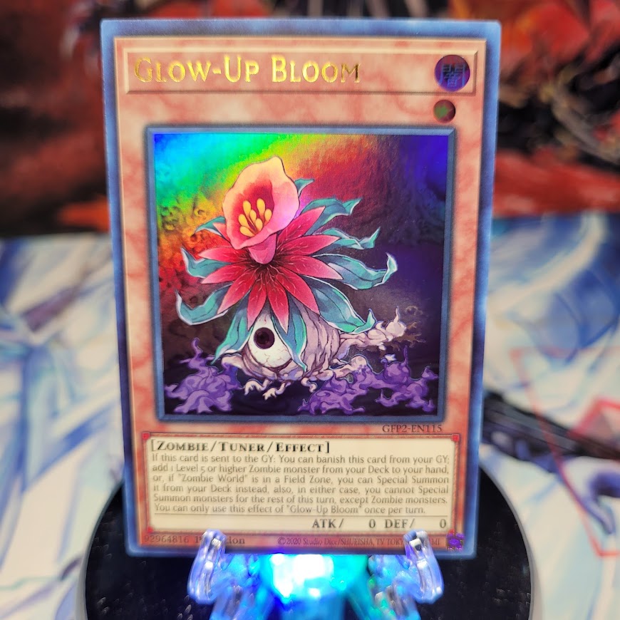  An Ultra Rare "Glow-Up Bloom" card from the Yugioh Set: Ghosts From the Past: The 2nd Haunting (GFP2).