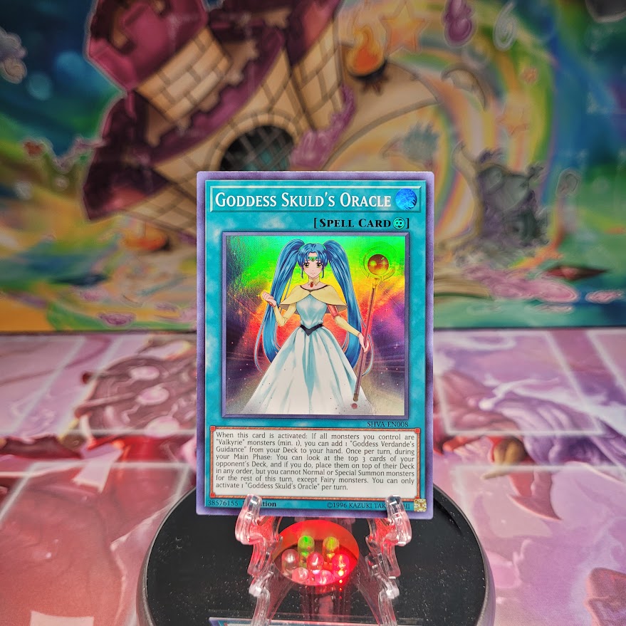 A Super Rare "Goddess Skuld's Oracle" card from the Yugioh Set: Shadows In Valhalla.