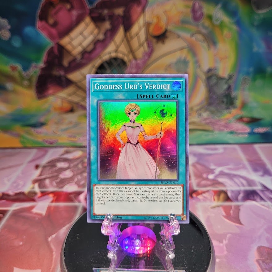 A Super Rare "Goddess Urd's Verdict" card from the Yugioh Set: Shadows In Valhalla.