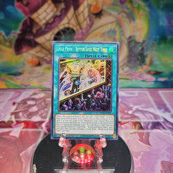 A Prismatic Secret Rare "Gold Pride - Better Luck Next Time!" card from the Yugioh 25th Anniversary: Dueling Mirrors Tin.