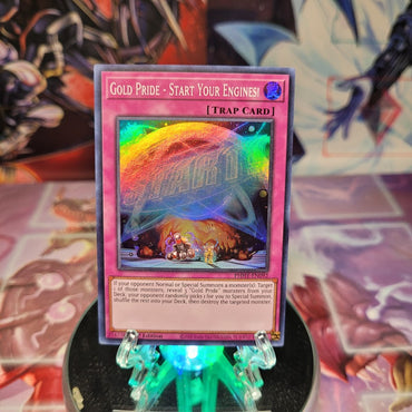 A Super Rare "Gold Pride - Start Your Engines!" card from the Yugioh Set: Photon Hypernova.