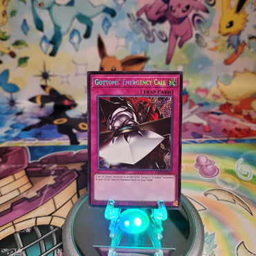A Secret Rare "Gottoms' Emergency Call" card from the Yugioh Legendary Modern Decks (L26D).