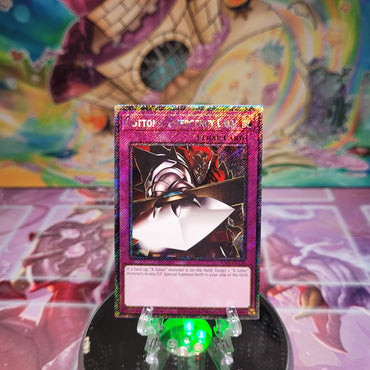 A Platinum Secret Rare "Gottoms' Emergency Call" card from the Yugioh Set: Quarter Century Stampede (RA04).
