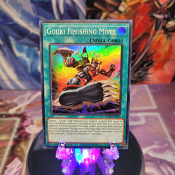 A Super Rare "Gouki Finishing Move" card from the Yugioh 2022 Tin of the Pharaoh's Gods Set (MP22).