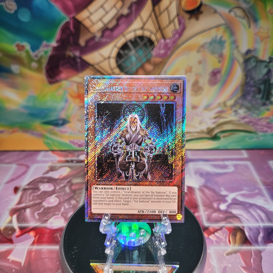 A Platinum Secret Rare "Grandmaster of the Six Samurai" card from the Yugioh Set: Quarter Century Bonanza (RA03)