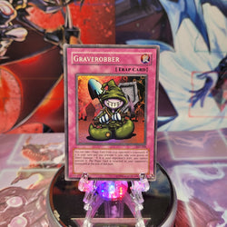 A Super Rare "Graverobber" card from the Yugioh Set: Pharaoh's Servant (PSV).